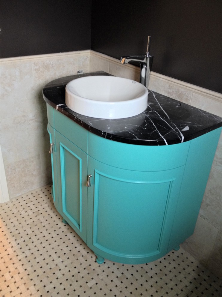 Small midcentury master bathroom in Omaha with furniture-like cabinets, turquoise cabinets, black and white tile, ceramic tile, black walls, marble floors, a vessel sink, marble benchtops, white floor and black benchtops.