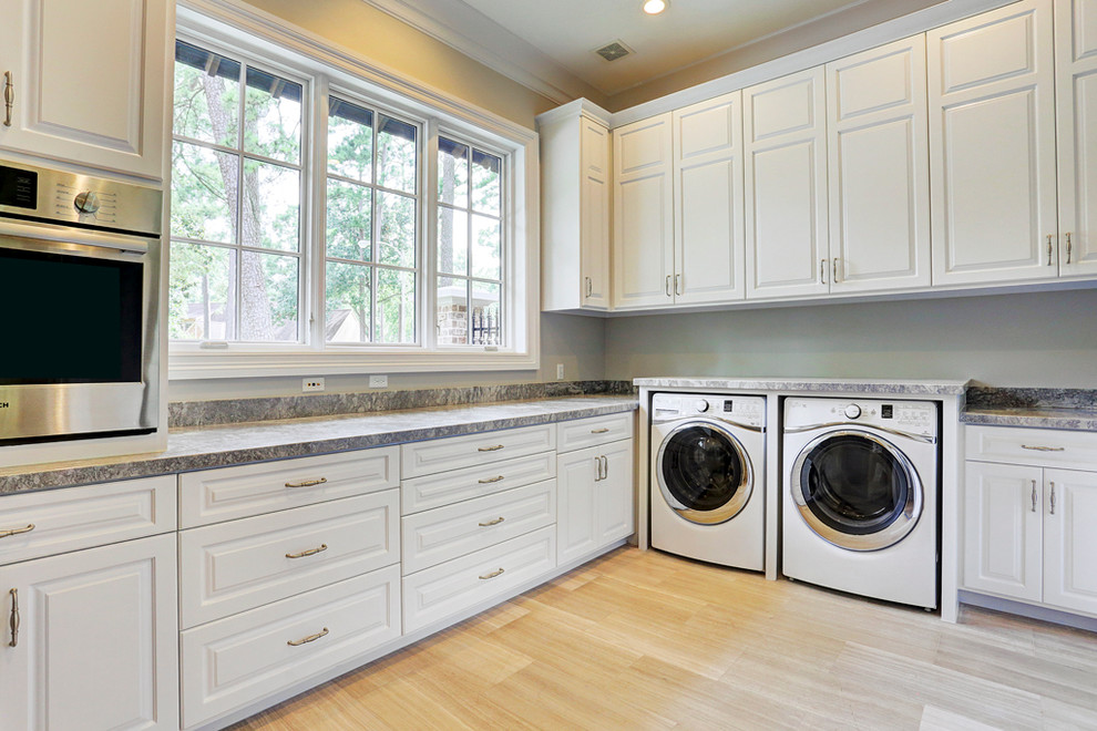 Traditional laundry room in Houston.