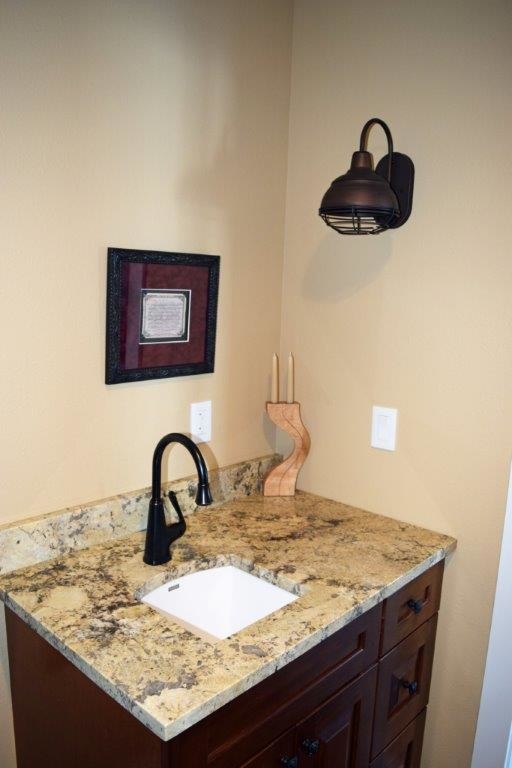 Basement - small transitional basement idea with beige walls