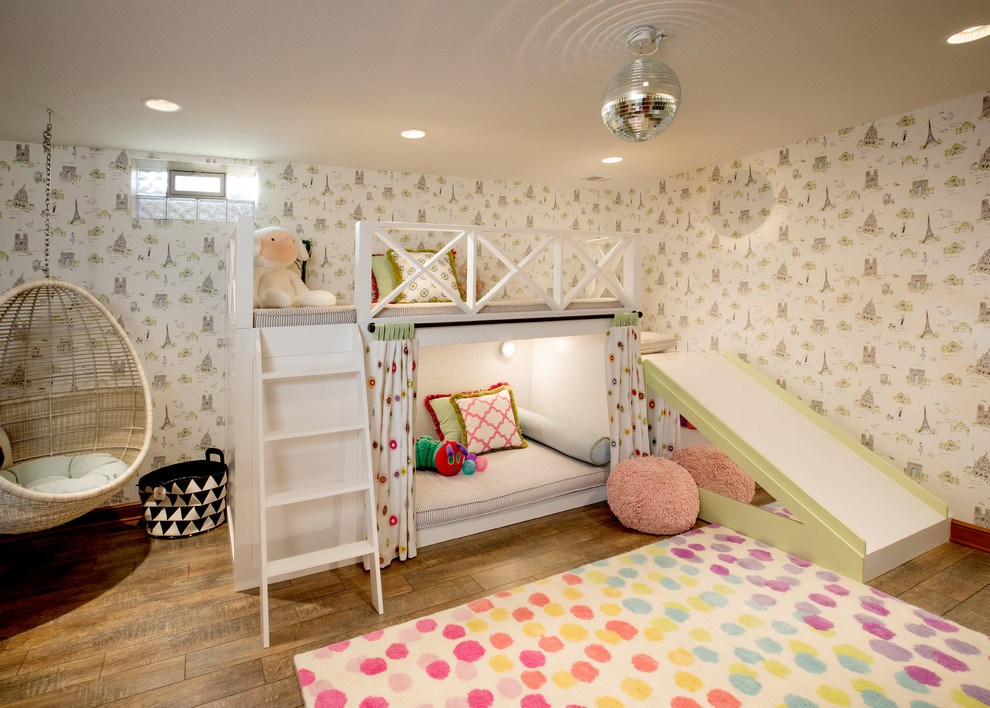 Inspiration for a transitional kids' bedroom for kids 4-10 years old and girls in Columbus with dark hardwood floors and brown floor.