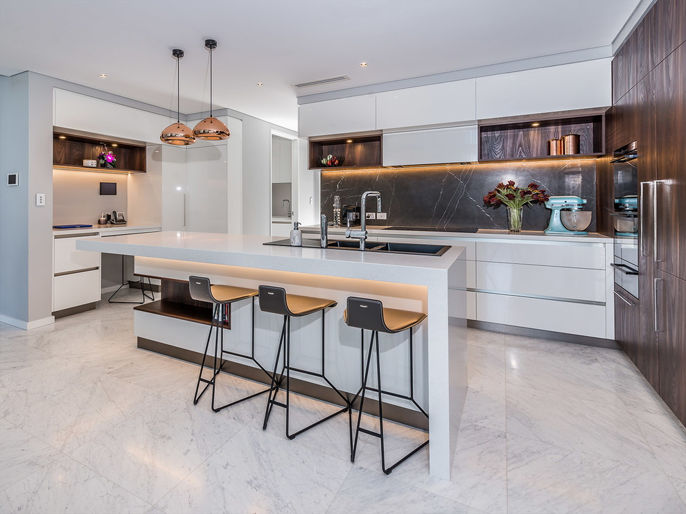 Contemporary galley kitchen in Perth with a drop-in sink, flat-panel cabinets, white cabinets, brown splashback, stainless steel appliances and with island.