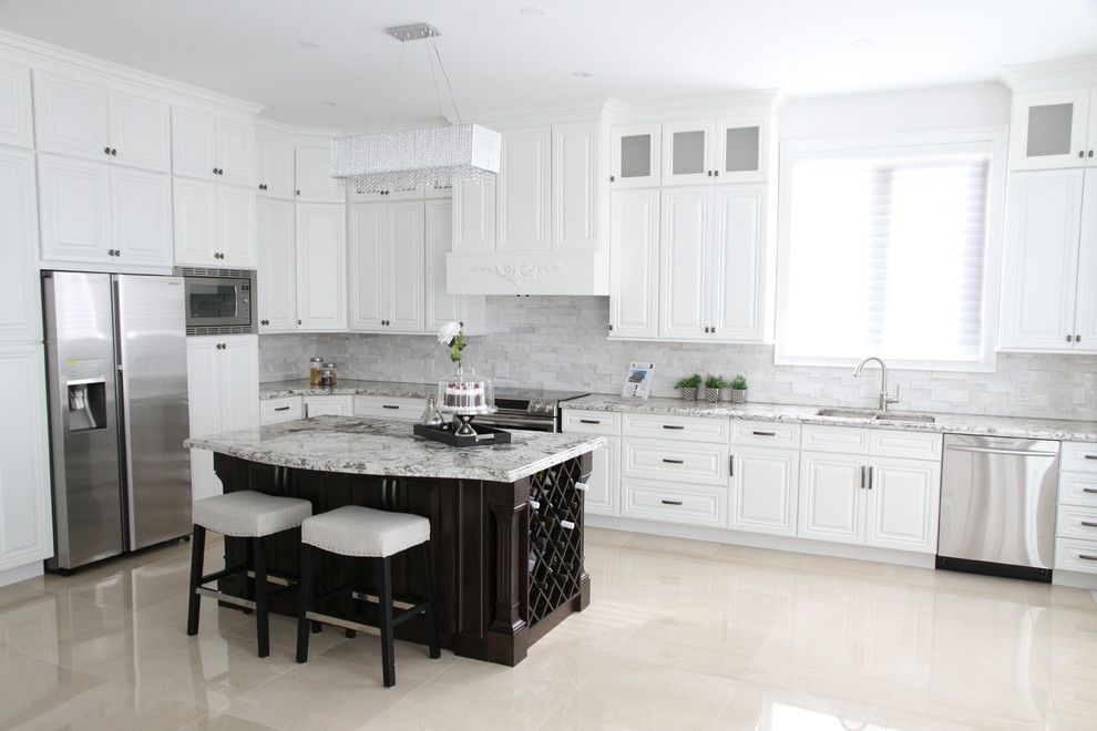 Inspiration for a large contemporary l-shaped eat-in kitchen in Toronto with a double-bowl sink, beaded inset cabinets, white cabinets, marble benchtops, grey splashback, stone tile splashback, stainless steel appliances, ceramic floors, with island and beige floor.