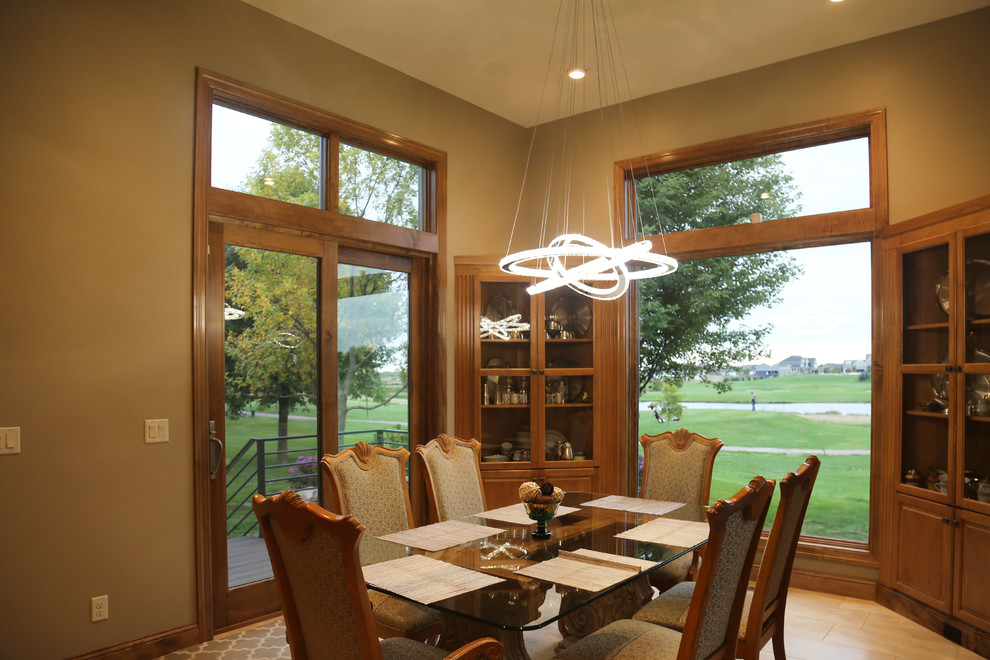 Inspiration for a mid-sized transitional porcelain tile kitchen/dining room combo remodel with beige walls and no fireplace