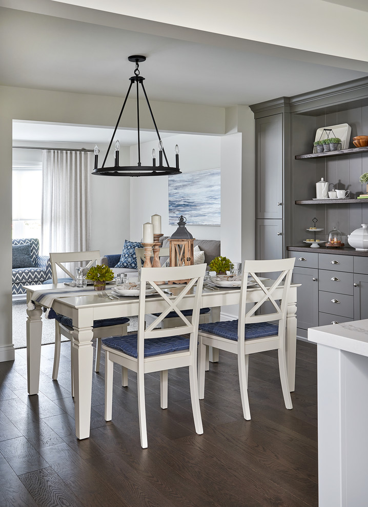 Great room - mid-sized transitional medium tone wood floor great room idea with white walls