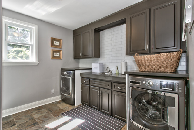 Transitional laundry room in Toronto.