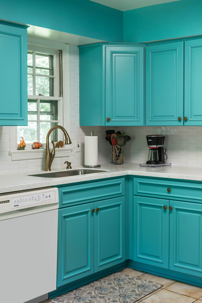 Inspiration for a mid-sized eclectic l-shaped kitchen in DC Metro with an undermount sink, blue cabinets, white splashback, porcelain splashback, white appliances, ceramic floors and multi-coloured floor.