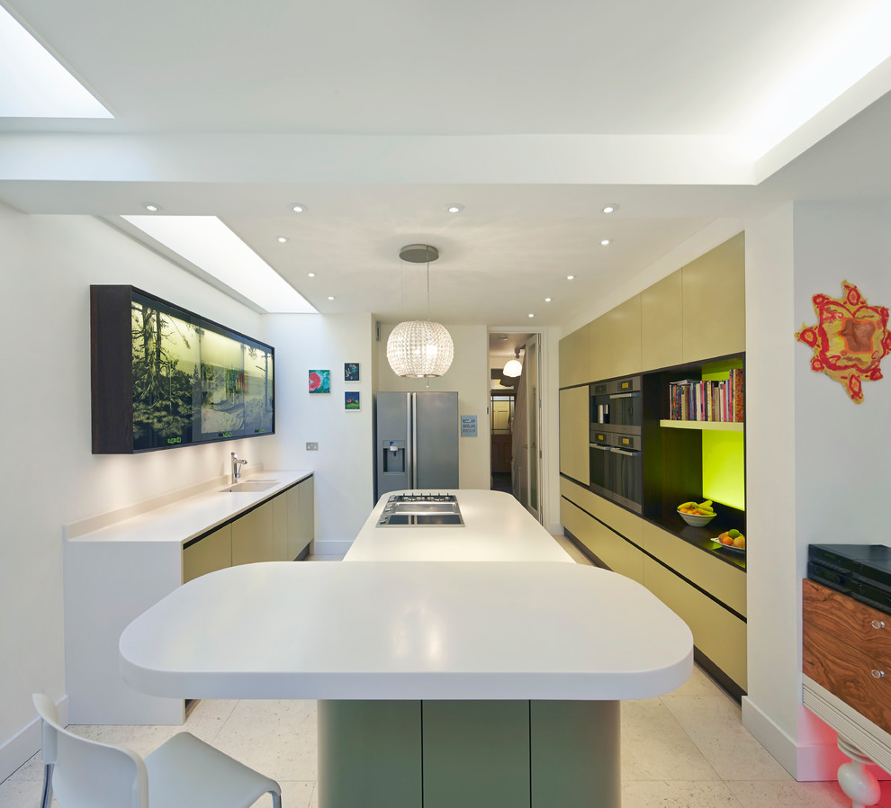 This is an example of a contemporary kitchen in London with solid surface benchtops, flat-panel cabinets and brown cabinets.