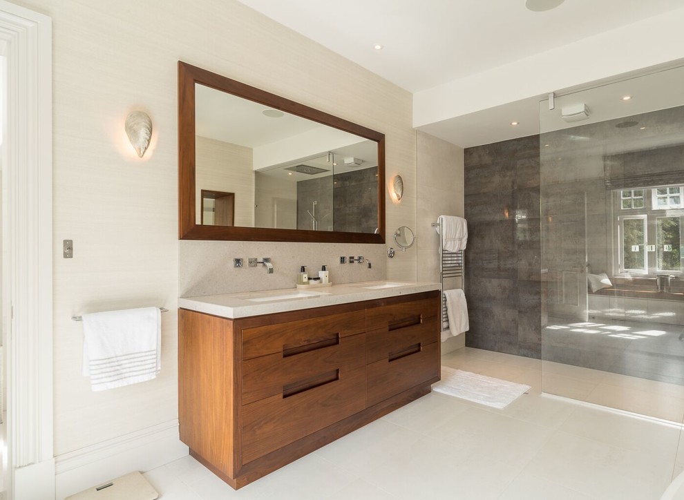Photo of a contemporary bathroom in Oxfordshire with flat-panel cabinets, medium wood cabinets, a curbless shower, beige walls and an open shower.