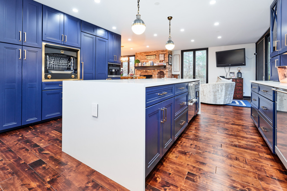 Grand Navy Kitchen With Full Height Cabinetry