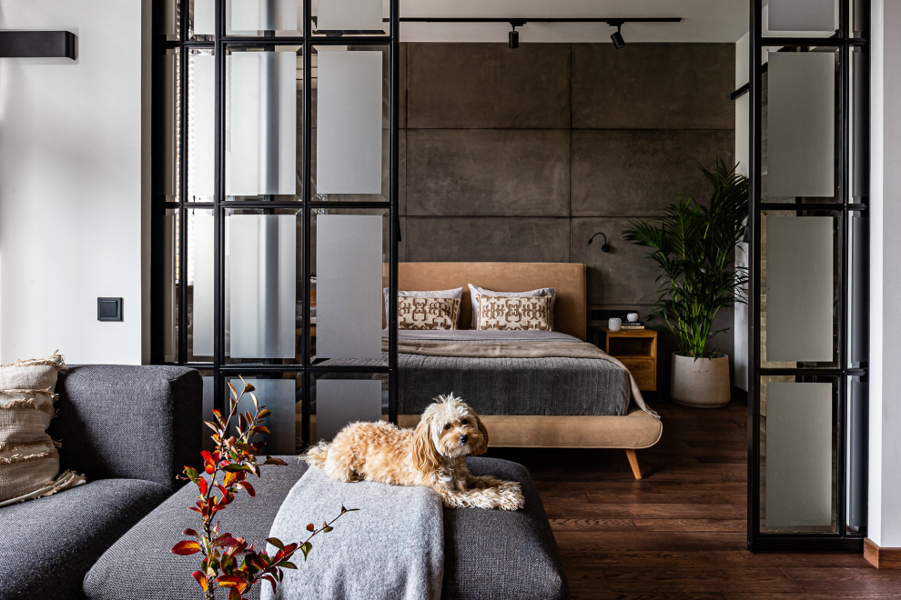 Mid-sized industrial master bedroom in Saint Petersburg with grey walls, vinyl floors, brown floor, wood and decorative wall panelling.
