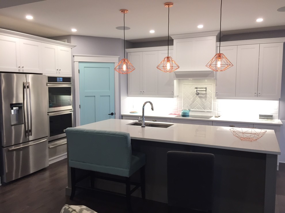 Example of a transitional kitchen design in Ottawa