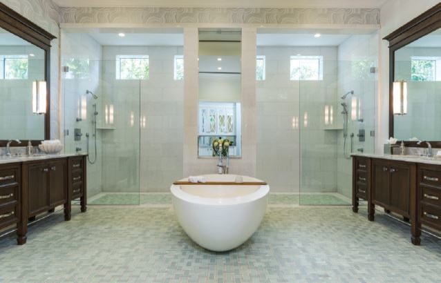 This is an example of a beach style master bathroom in Miami with furniture-like cabinets, brown cabinets, a freestanding tub, a curbless shower, mosaic tile floors, an undermount sink, onyx benchtops, green floor and an open shower.