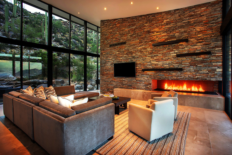 Inspiration for an expansive contemporary open concept family room in Phoenix with a ribbon fireplace and a wall-mounted tv.