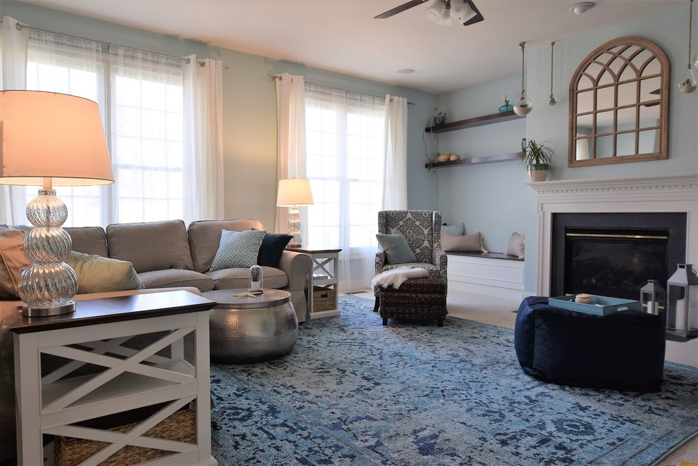 Mid-sized beach style open concept family room in DC Metro with blue walls, carpet, a standard fireplace, a wood fireplace surround and a wall-mounted tv.