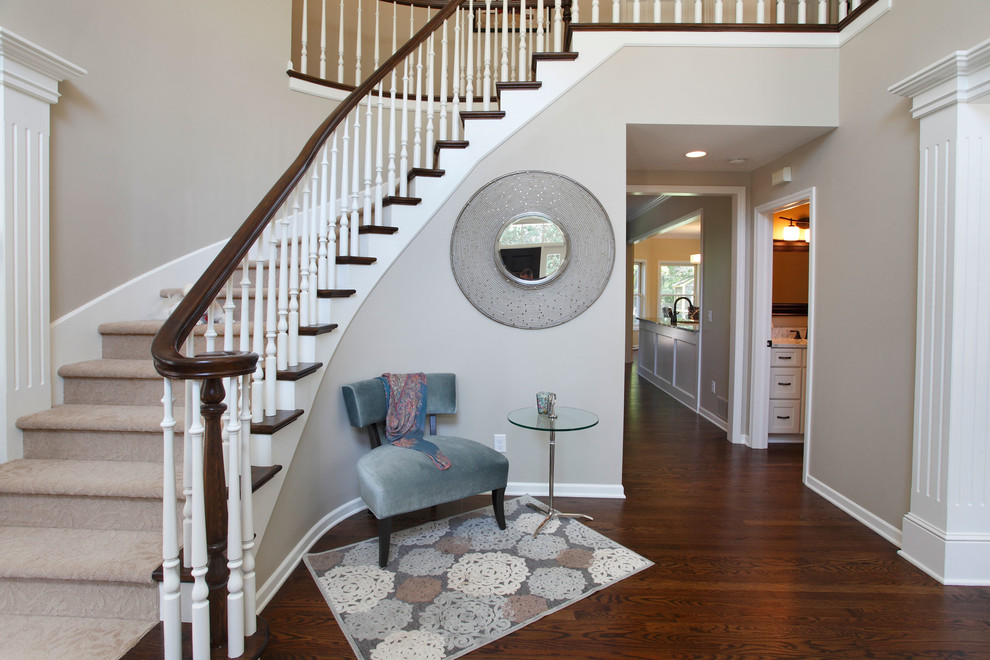 This is an example of a traditional foyer in Minneapolis with grey walls.