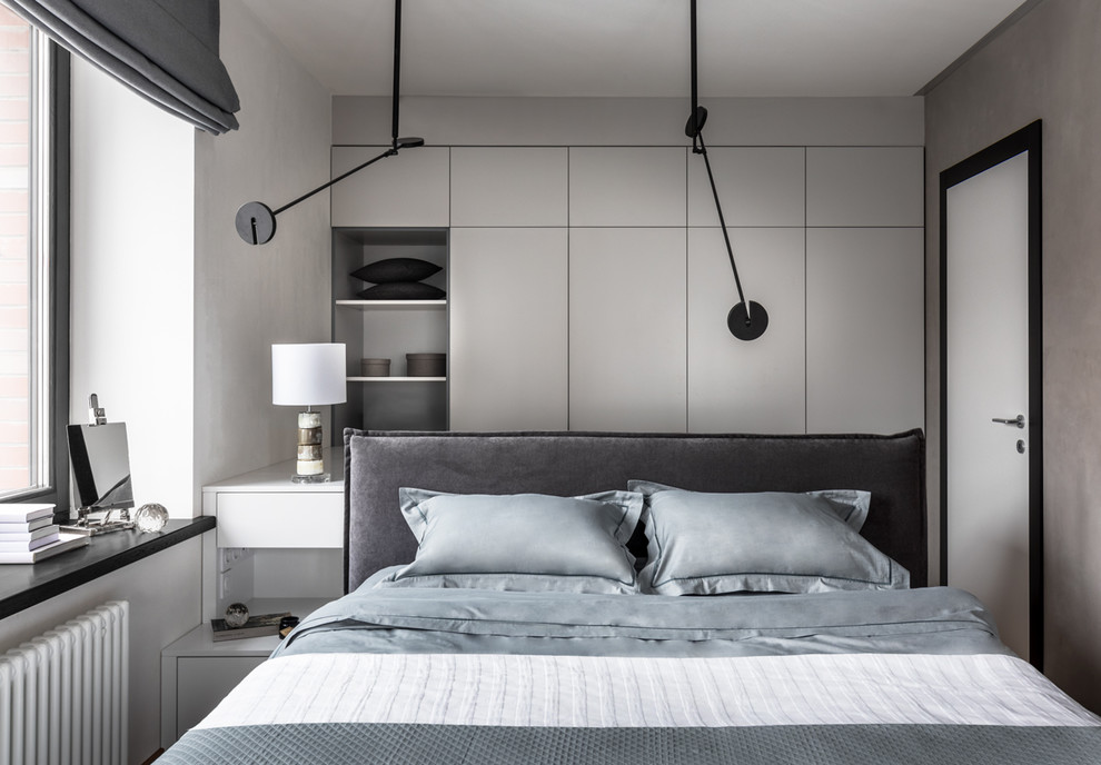 Mid-sized contemporary master bedroom in Moscow with grey walls.