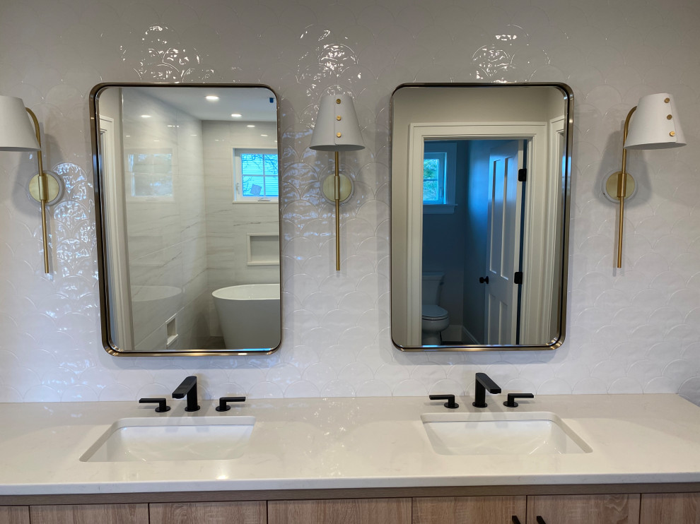 Example of a transitional home design design in Boston