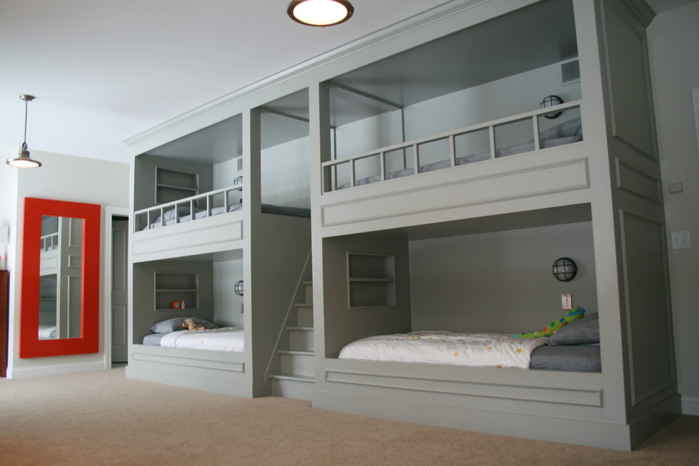 This is an example of a traditional gender-neutral kids' bedroom for kids 4-10 years old in Other with grey walls and carpet.