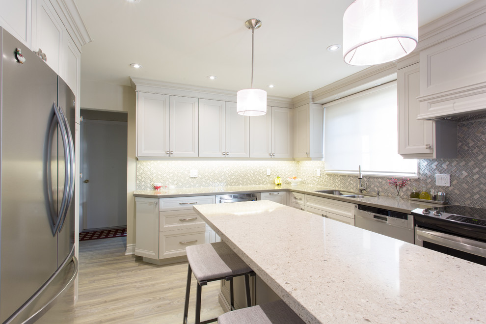 Example of a transitional kitchen design in Toronto
