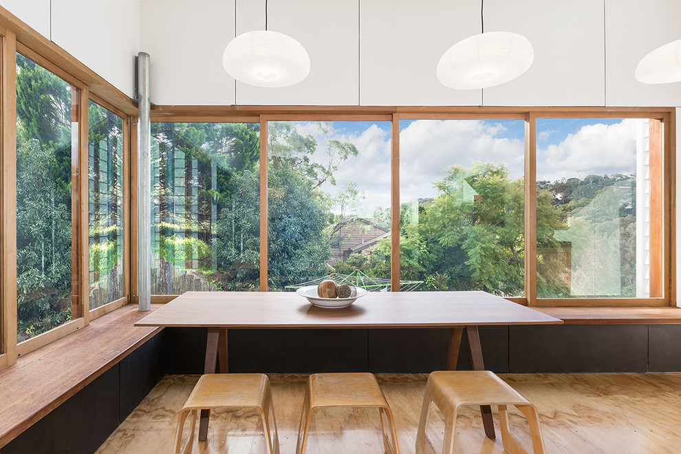 This is an example of a scandinavian kitchen/dining combo in Sydney.