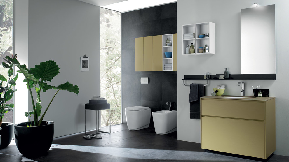 Design ideas for a large modern master bathroom in Melbourne with an integrated sink, raised-panel cabinets, yellow cabinets, wood benchtops, an open shower, a one-piece toilet, gray tile, cement tile, white walls and concrete floors.
