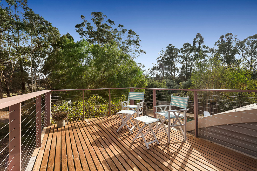 Design ideas for a mid-sized beach style deck in Melbourne with no cover.