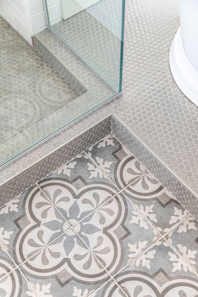 Home design - mid-sized transitional master white tile and ceramic tile ceramic tile and gray floor home design idea in Seattle with white walls, an undermount sink, quartz countertops and a hinged shower door