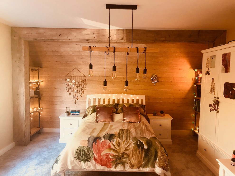 Inspiration for a medium sized urban guest bedroom in Cheshire with beige walls, carpet and grey floors.
