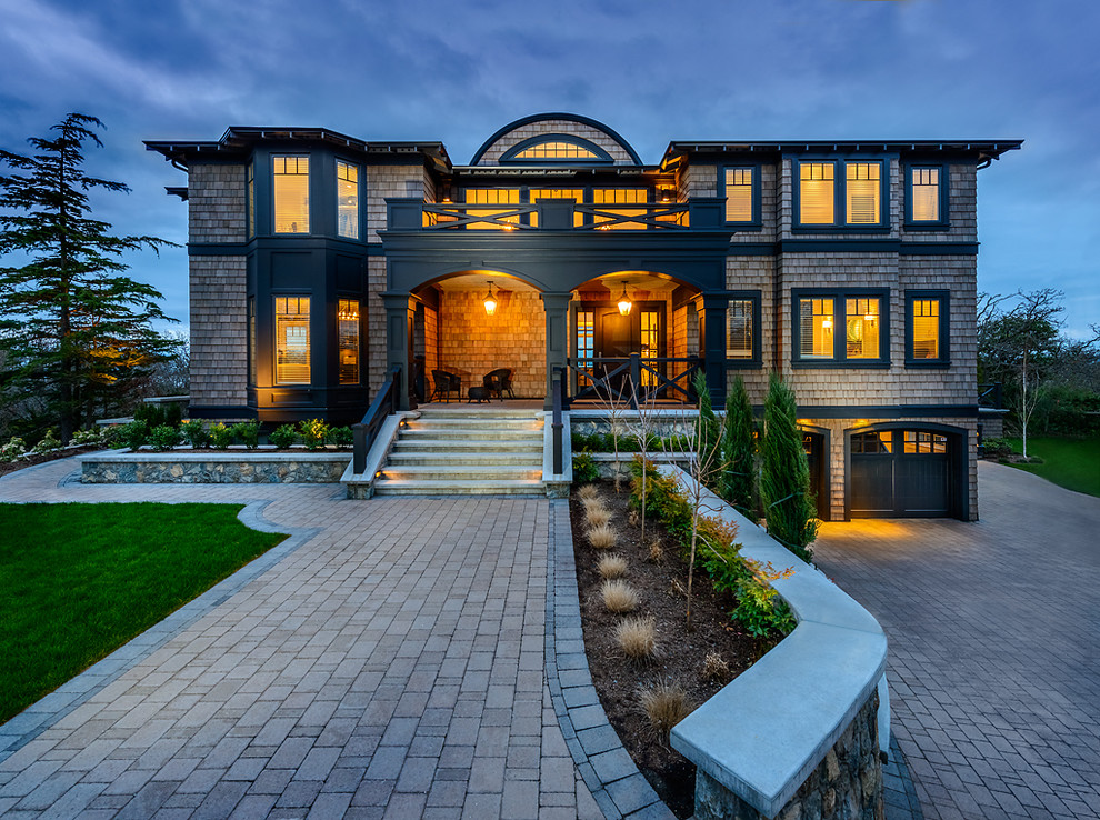 Inspiration for a mid-sized traditional two-storey exterior in Vancouver with wood siding.