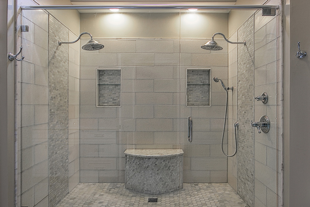 This is an example of a mid-sized traditional master bathroom in Other with beaded inset cabinets, white cabinets, a double shower, porcelain tile, brown walls, porcelain floors, an undermount sink, beige floor, gray tile, marble benchtops and a sliding shower screen.