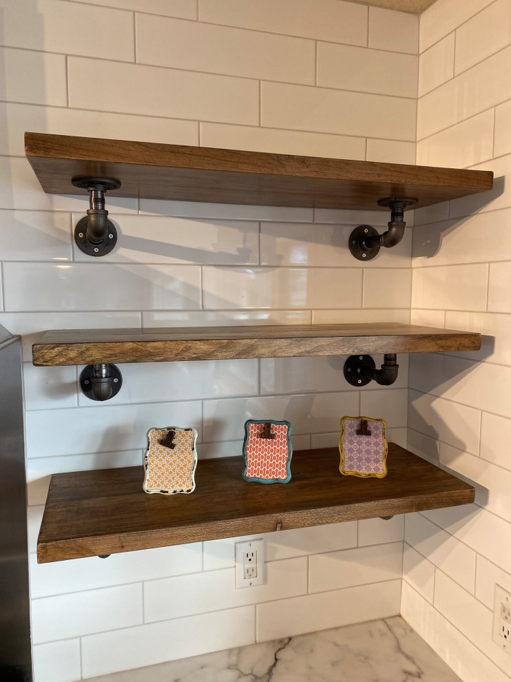 Inspiration for a large transitional eat-in kitchen remodel