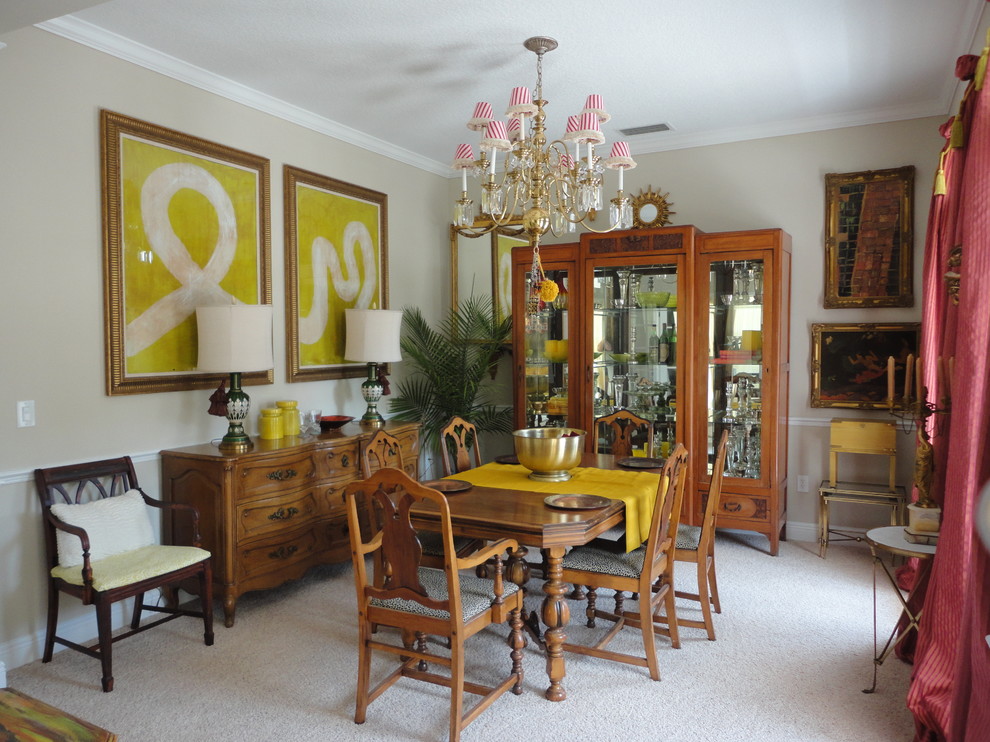 This is an example of an eclectic dining room in Tampa.
