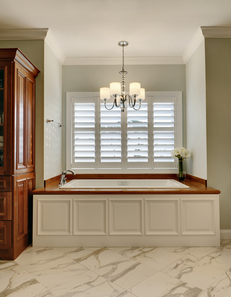This is an example of a traditional bathroom in Philadelphia with a drop-in tub.