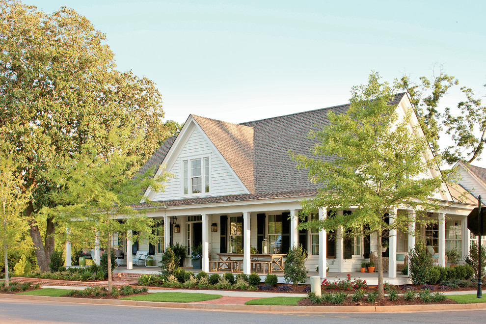 Design ideas for a mid-sized country two-storey exterior in Atlanta.