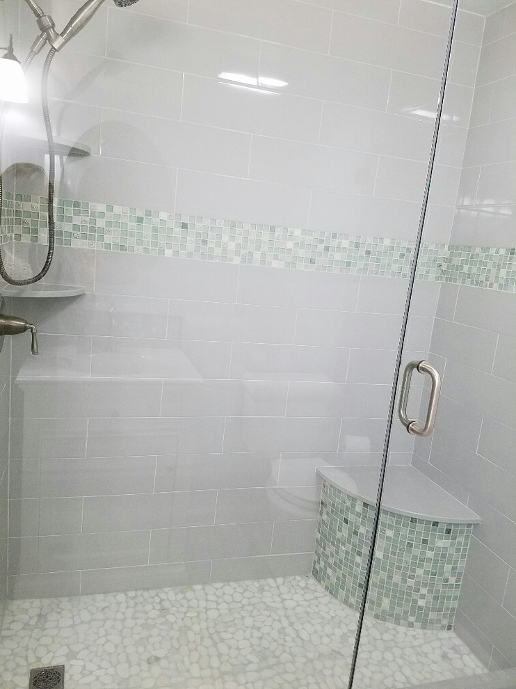 Inspiration for a mid-sized transitional 3/4 gray tile and ceramic tile alcove shower remodel in Bridgeport