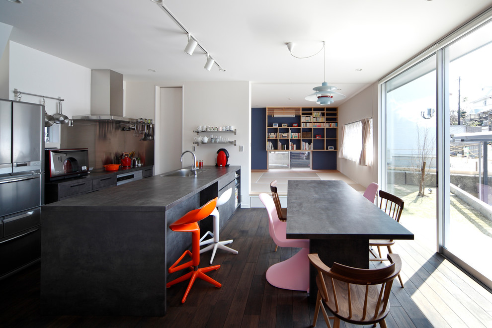 Inspiration for a contemporary open plan dining in Osaka with white walls, dark hardwood floors and brown floor.