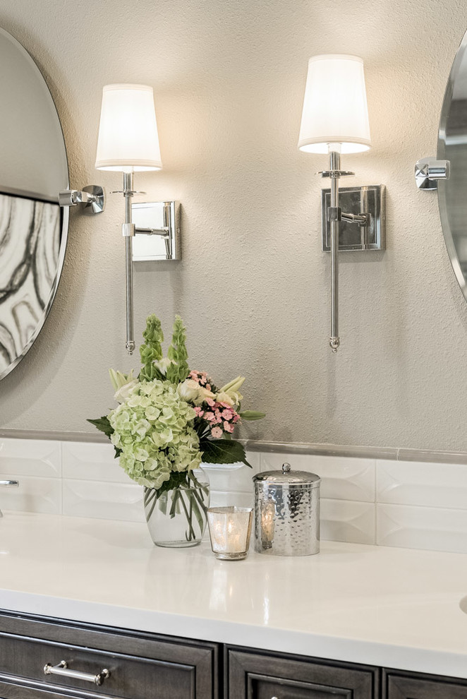 Mid-sized transitional master gray tile and porcelain tile ceramic tile and beige floor home design photo with recessed-panel cabinets, dark wood cabinets, a one-piece toilet, gray walls and quartz countertops