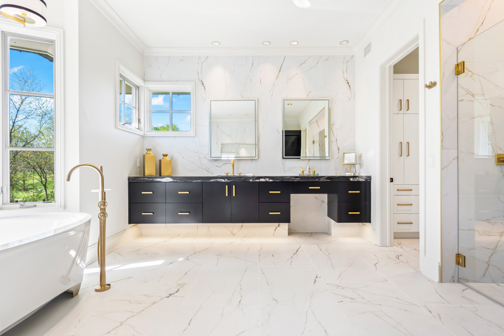 Large minimalist master marble tile marble floor and double-sink bathroom photo in Kansas City with flat-panel cabinets, black cabinets, granite countertops, a hinged shower door, a niche and a floating vanity