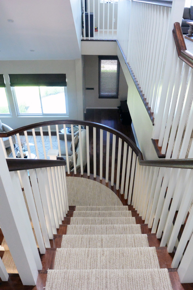 Carpeted u-shaped staircase in Los Angeles with carpet risers.