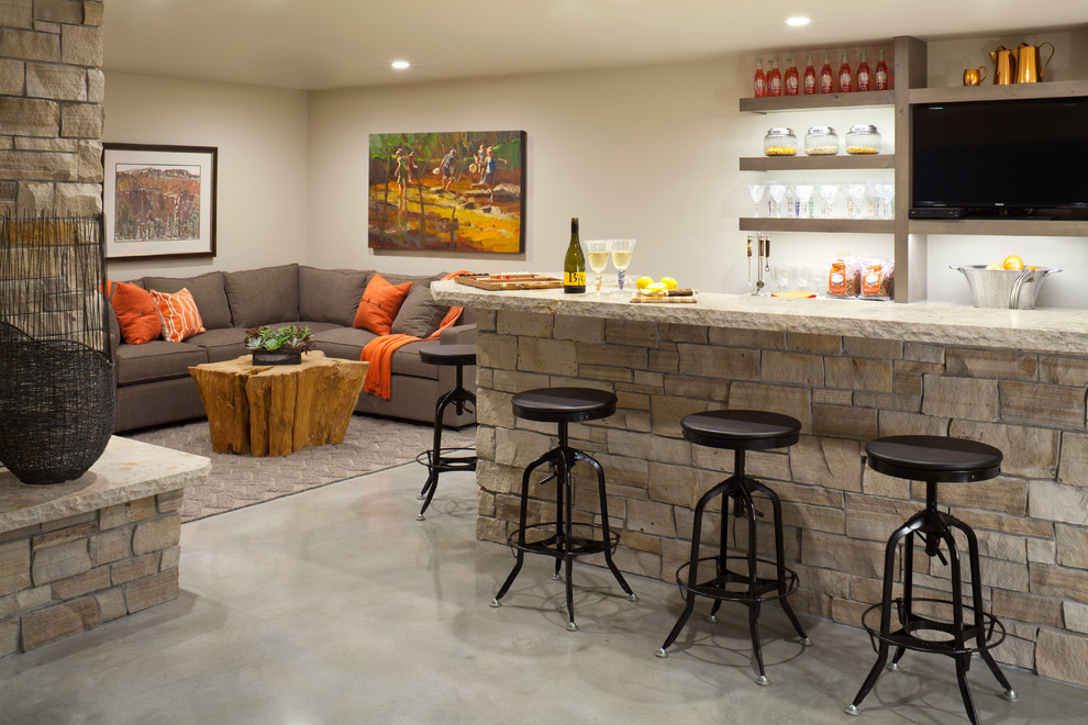 Photo of a transitional seated home bar in Denver.