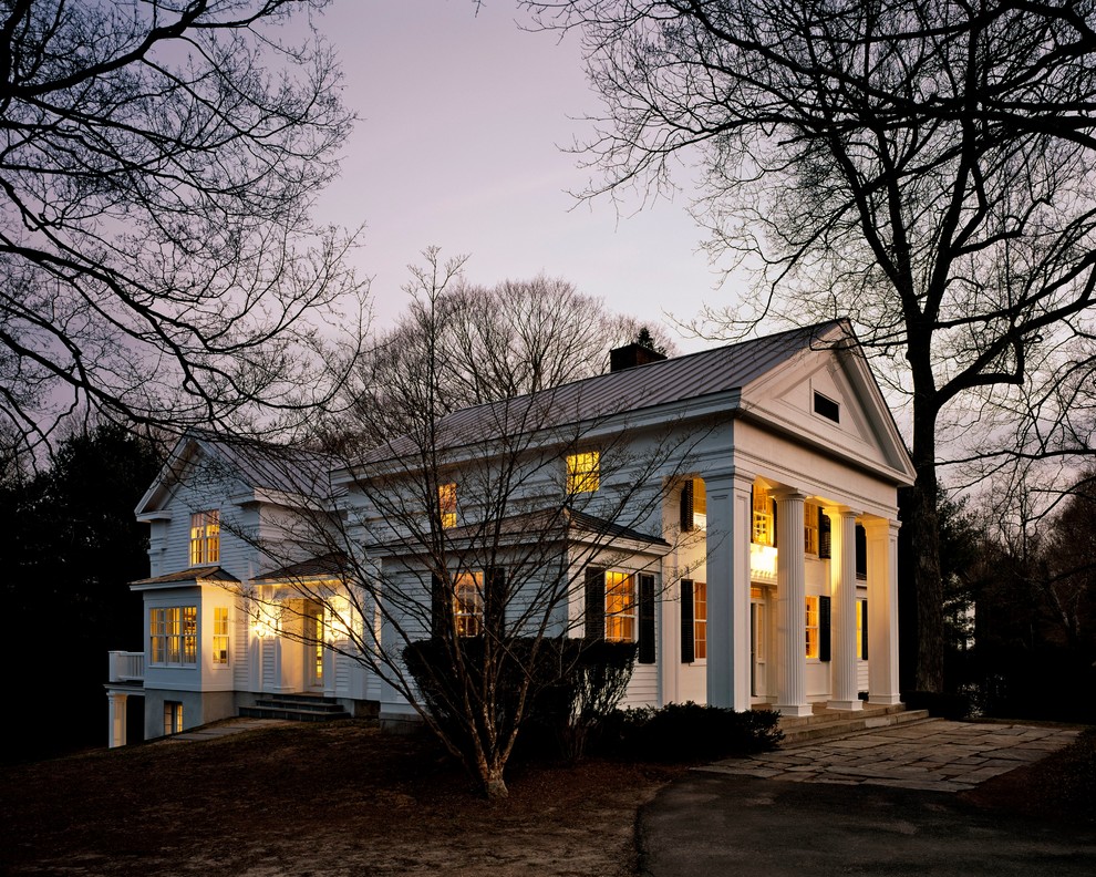 Inspiration for a mid-sized timeless white two-story wood exterior home remodel in New York
