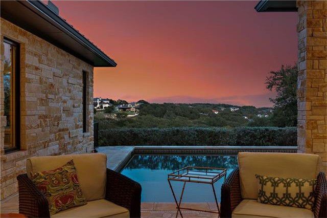 Transitional pool photo in Austin