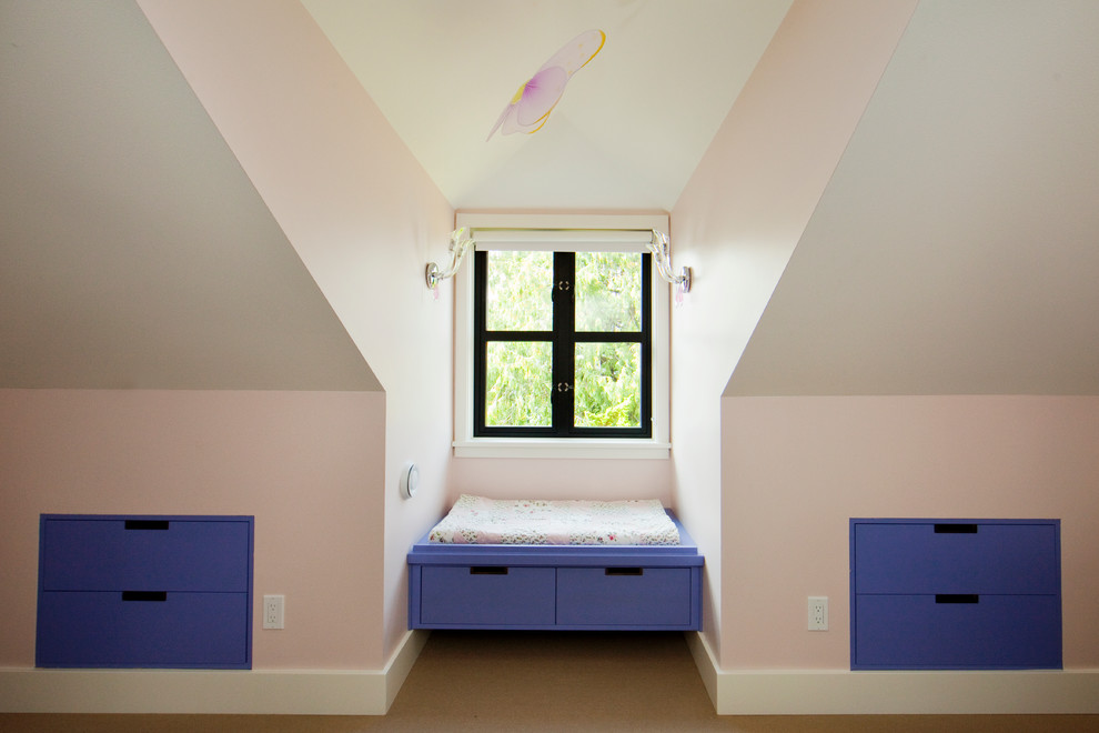 Design ideas for a mid-sized arts and crafts loft-style bedroom in Seattle with pink walls.