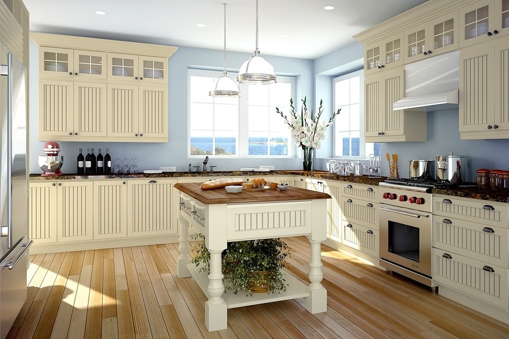 Design ideas for a mid-sized traditional l-shaped open plan kitchen in Seattle with shaker cabinets, beige cabinets, granite benchtops, blue splashback, stainless steel appliances, light hardwood floors, with island, beige floor and brown benchtop.