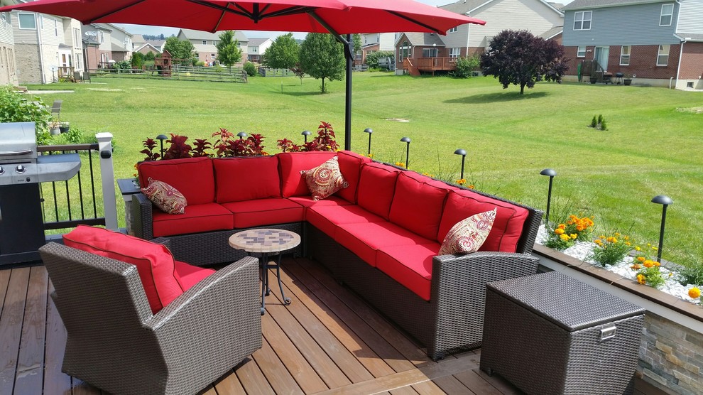 Deck - large traditional backyard deck idea with no cover
