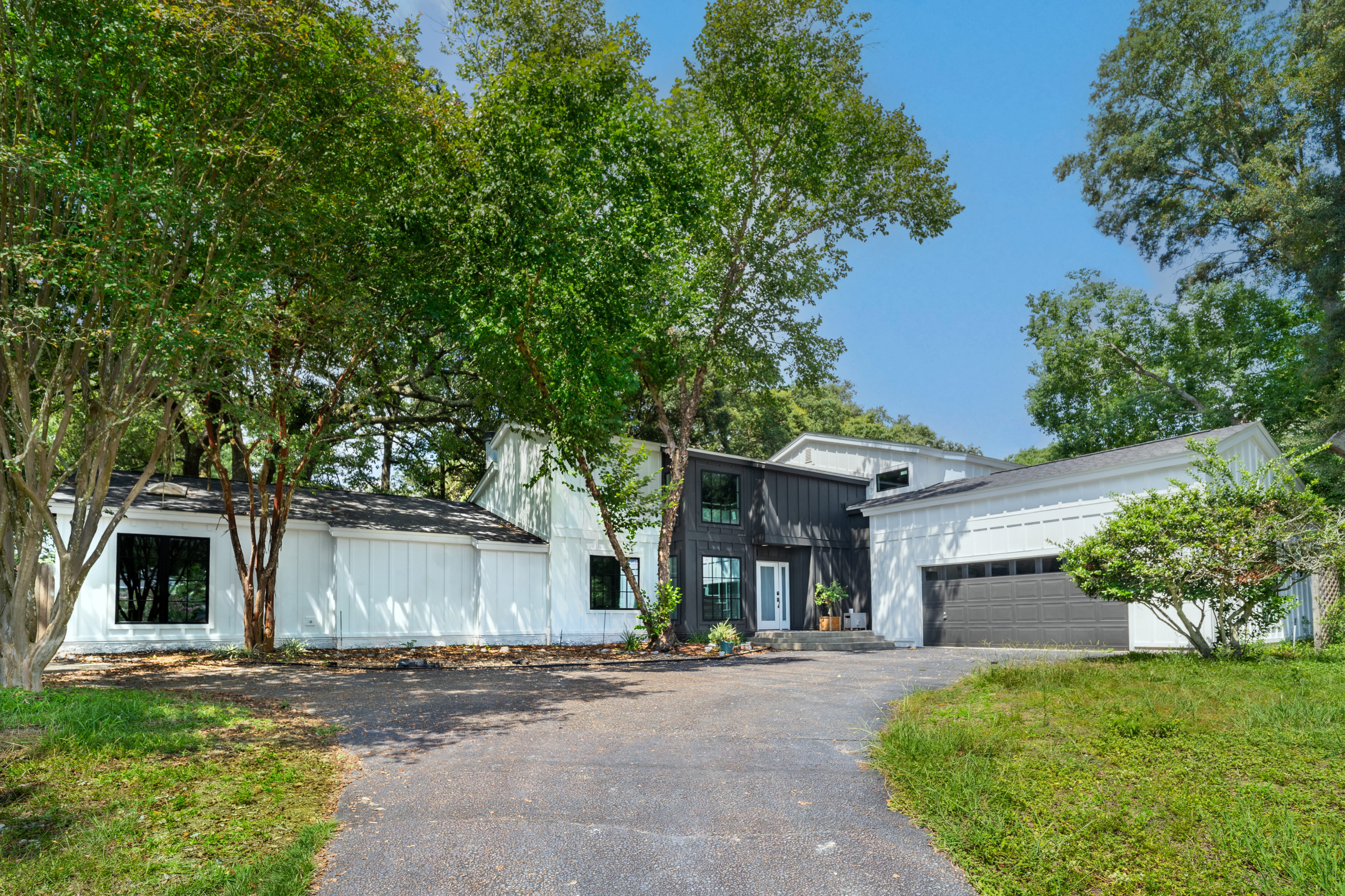 Completed Pensacola siding and window remodel by Lifetime Home Exteriors.