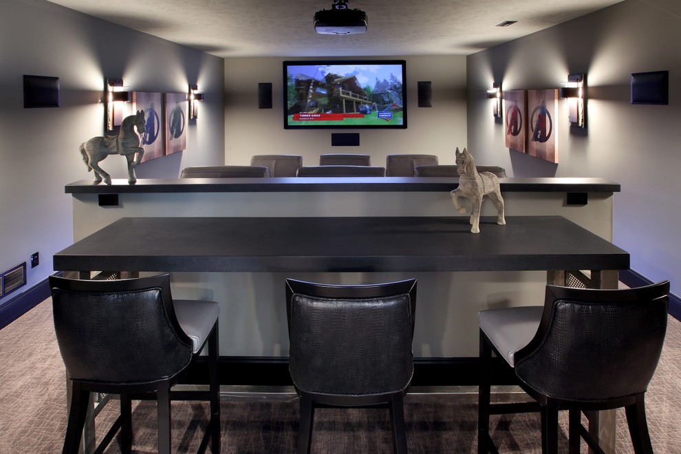 Design ideas for a transitional enclosed home theatre in Grand Rapids with grey walls, a projector screen and carpet.