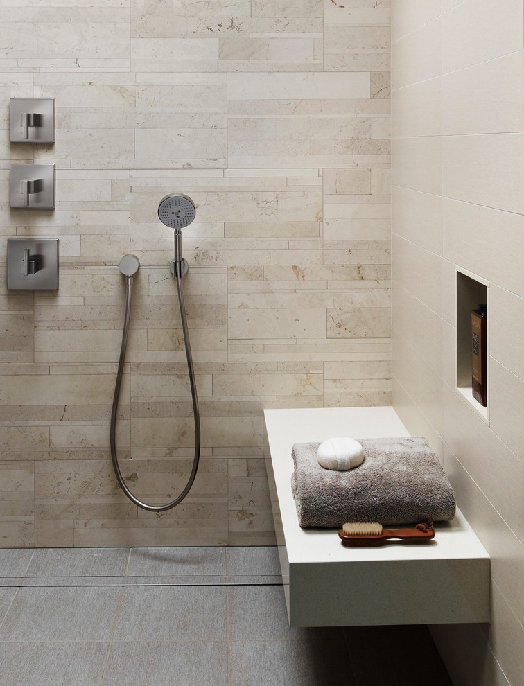Design ideas for a modern bathroom in Philadelphia with a curbless shower, beige tile, stone tile, beige walls, porcelain floors, grey floor and a hinged shower door.