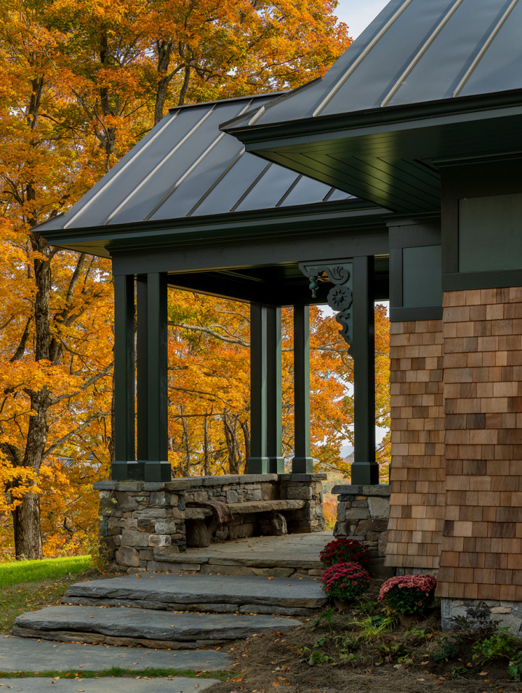 Mountain style home design photo in Burlington