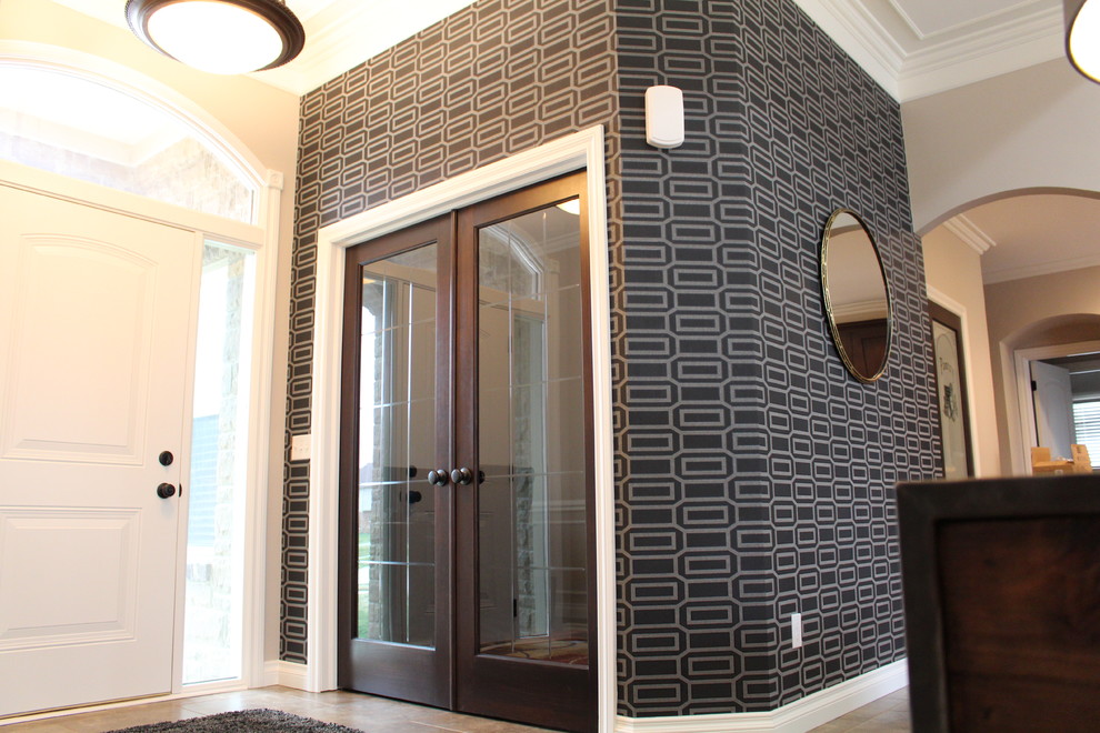 Mid-sized contemporary foyer in Chicago with black walls, ceramic floors and a single front door.